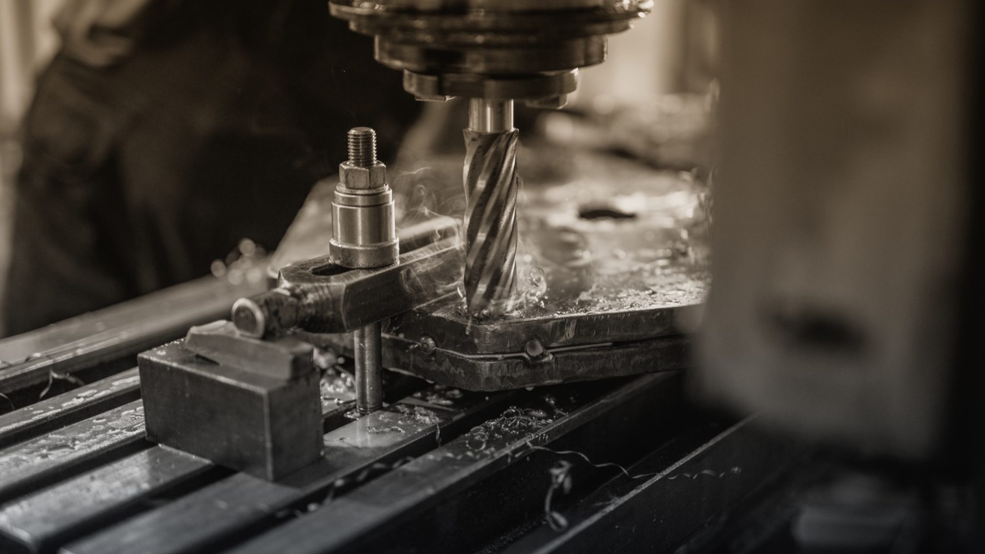 Industrial machine drilling metal.